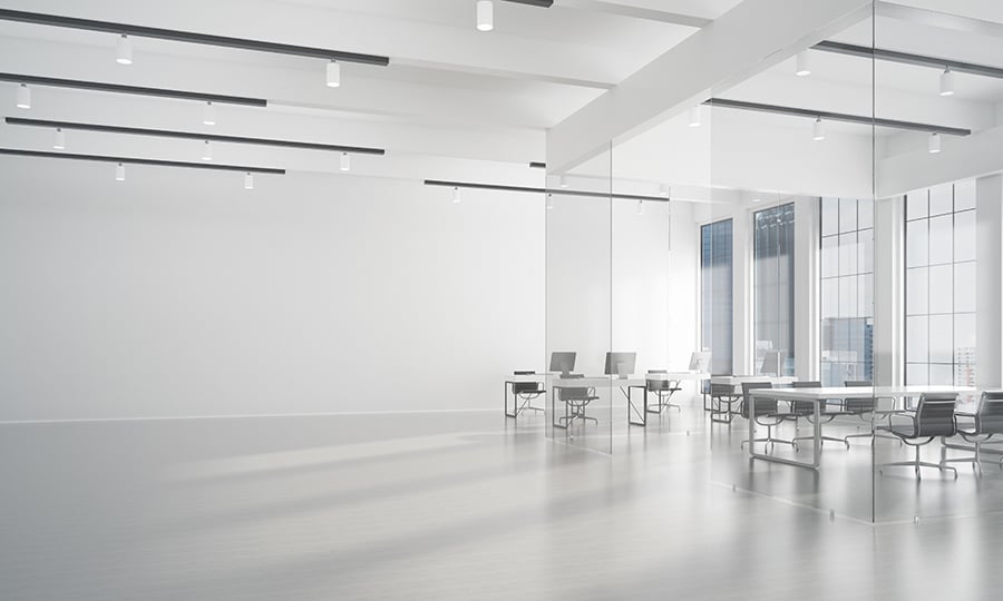 White modern office with table and chairs